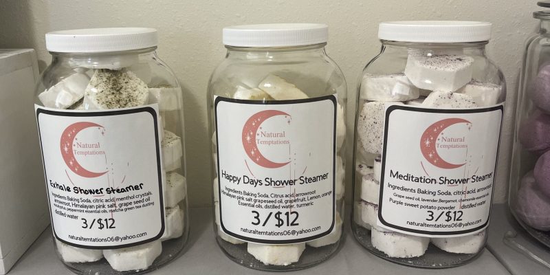 Glass jars of homemade shower steamers